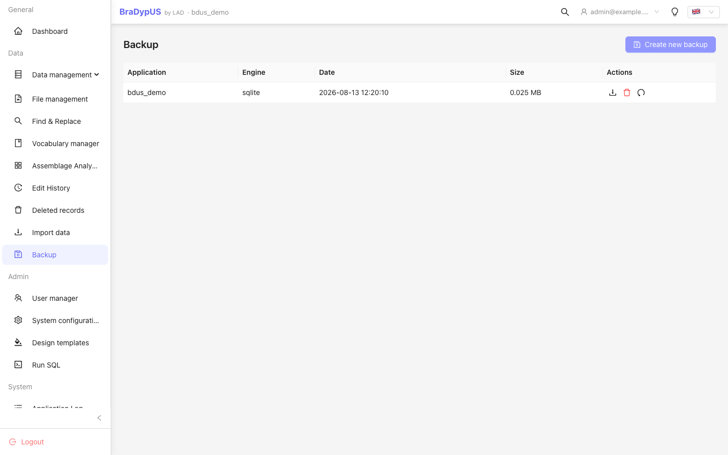 BackupView showing a list of existing backups with date, size, and action buttons